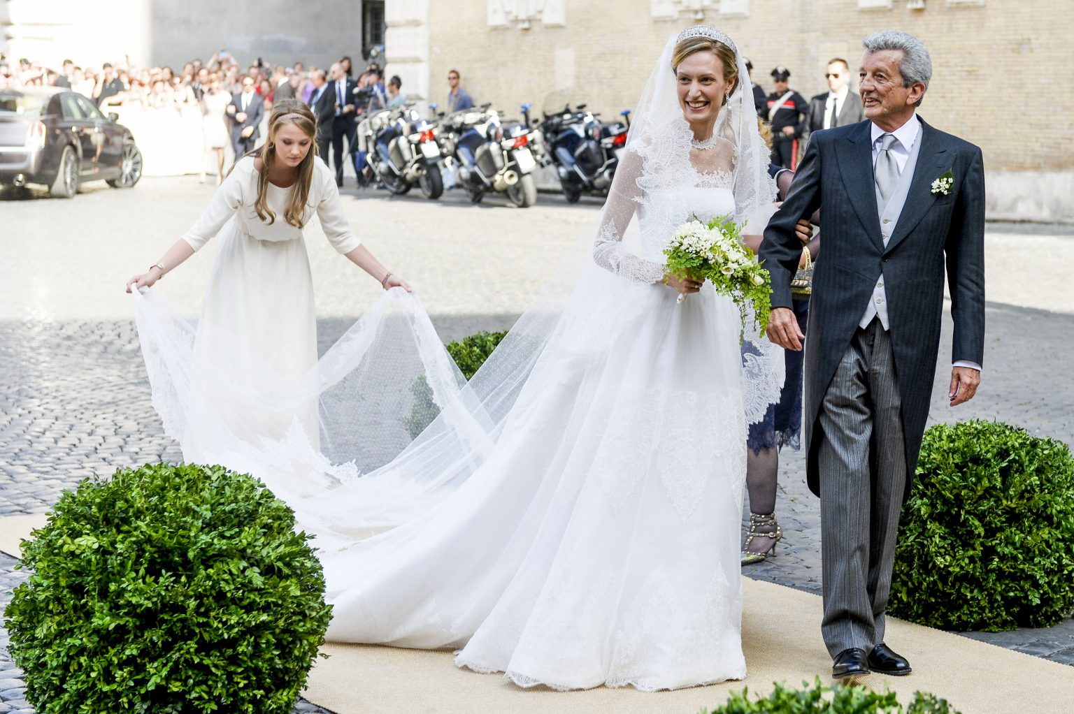 Roma July 5, 2014
Wedding of Prince Amedeo , nephew of King Philippe of Belgium, and Mlle. Elisabetta Maria Rosboch von Wolkenstein at the Basilica di Santa Maria in Trastevere. Prince Amedeo ( born on 21 February 1986 ) is the elder son of Princess Astrid, (sister of King Philippe) and archduke Lorenz. Elisabetta ( nickname Lili - born in Roma on 9 September 1987 ) is the daughter of Ettore Rosboch von Wolkenstein and Countess Lilia de Smecchia . He has studied Finance and she is journalist and photographer. They met in London a few years ago when the Prince was studying at the London School of Economics and Political Sciences.
Pix....   Ettore Rosboch von Wolkenstein / Elisabetta Maria Rosboch von Wolkenstein ( Lili ) 
Credit Frederic Sierakowski / Isopix